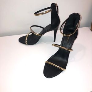 🔥black and gold bebe stilettos🔥
